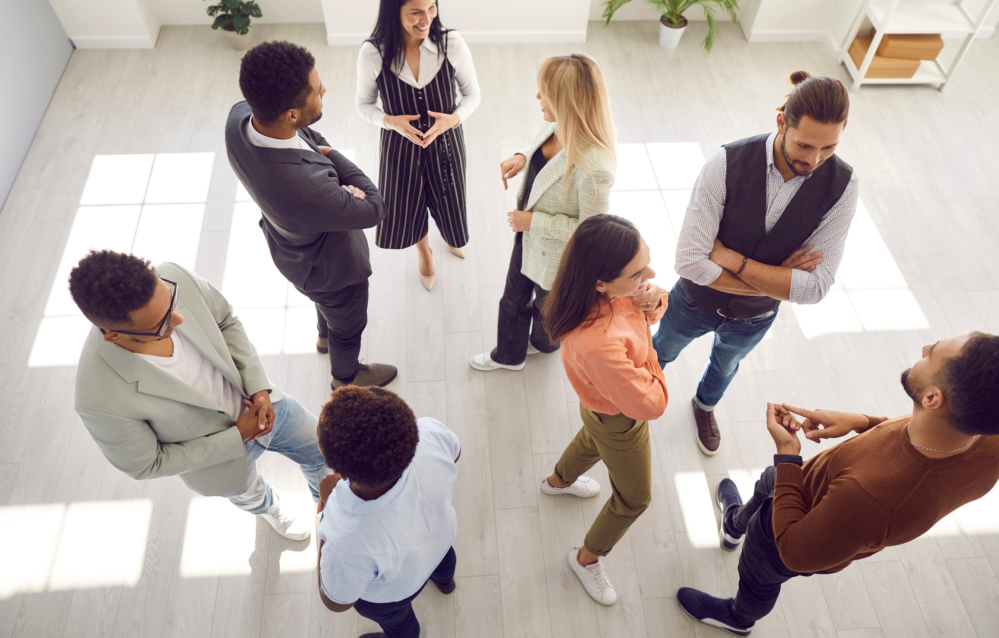 Group of diverse people communicating at business event